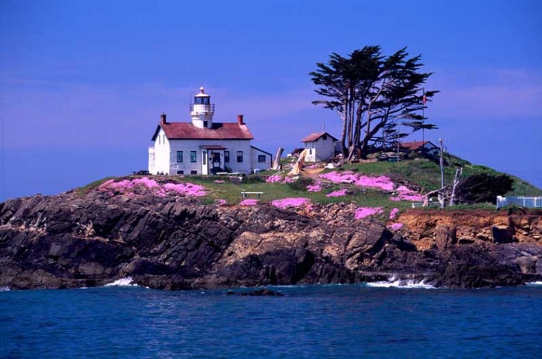 The Historic Battery Point Lighthouse (built in 1855) on a Rocky Island at Crescent City California United States USA